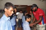 Chris Gayle spend time with NGO kids in Worli, Mumbai on 26th April 2013 (6).JPG